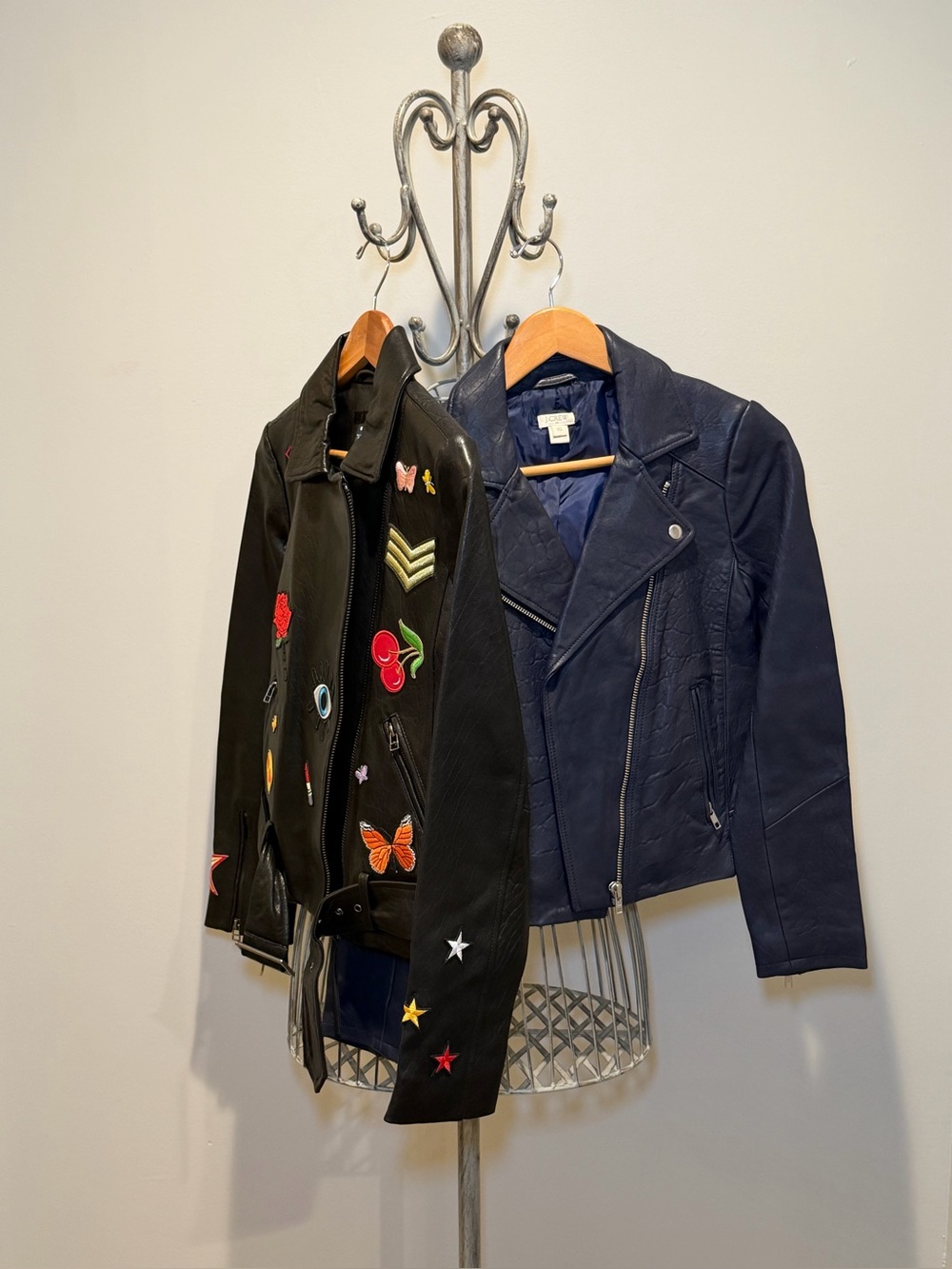 BUNDLE OF 2: BLACK EMBROODED LEATHER JACKET, AND NAVY LEATHER JACKET.